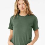 Woman wearing a pine colored Bella + Canvas jersey unisex short sleeved t-shirt