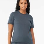 Brunette woman wearing a vintage navy colored Bella + Canvas jersey unisex short sleeved t-shirt