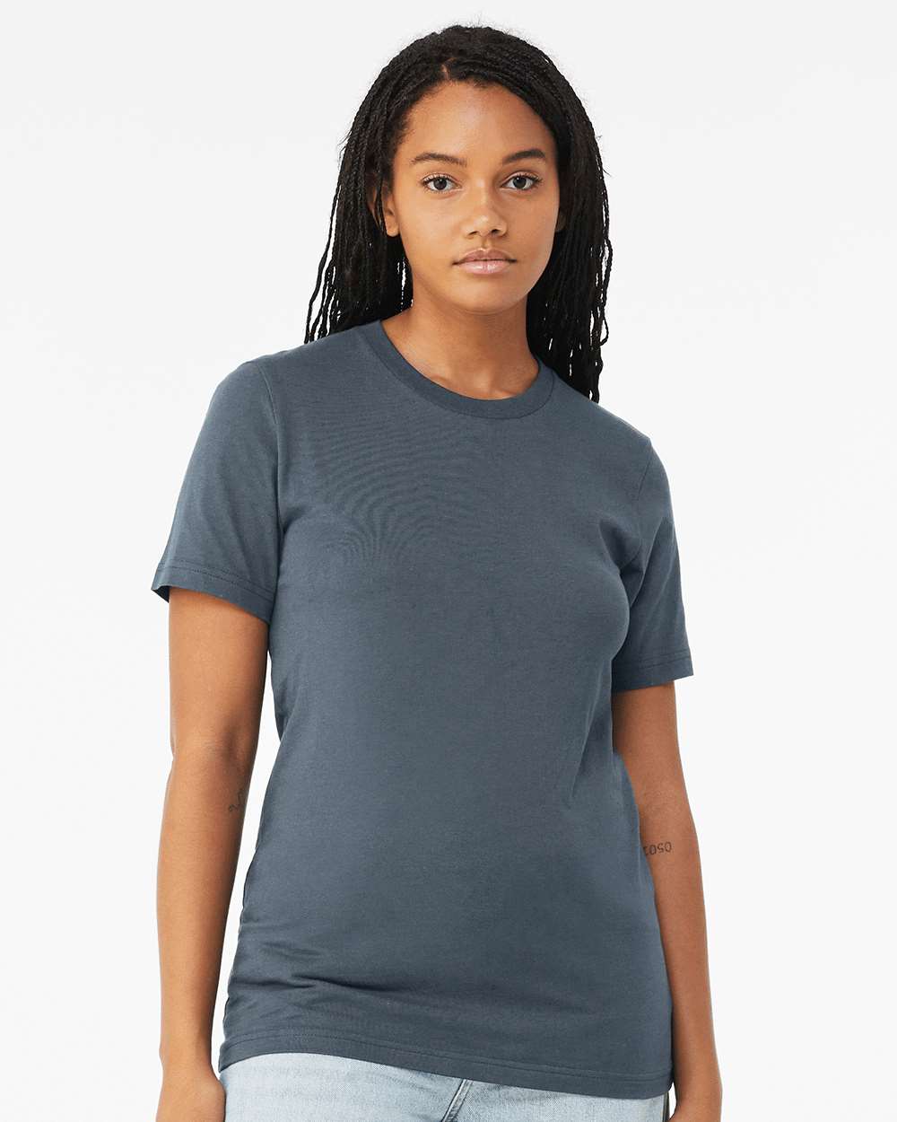 Brunette woman wearing a vintage navy colored Bella + Canvas jersey unisex short sleeved t-shirt