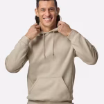 Gildan Custom Dryblend Hooded Sweatshirt in sand beige color, crafted from a durable moisture-wicking cotton-poly blend. Designed with a double-lined hood, front pocket, and ribbed trim. Shown plain and ideal for personalized printing or branding.