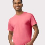 Man wearing Gildan Heavy Cotton t-shirt in coral color