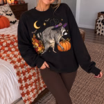 Woman wearing a Jimothy Halloween crewneck sweatshirt