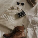 A Cute Custom Bride Embossed Puff Print Sweatshirt in white. This was taken for a photoshoot during the bachelorette party.