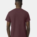 Man standing backwards wearing a dark maroon Gildan Dryblend 50/50 short sleeve t-shirt.
