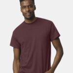 Man wearing a dark maroon Gildan Dryblend 50/50 short sleeve t-shirt.