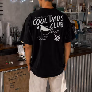 Cool dads club shirt in black variant being worn by man