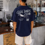 Man wearing cool dads club shirt in navy blue variant