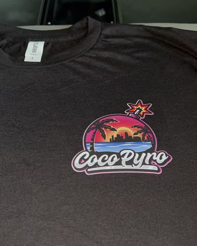 T-shirt printed with a custom logo sent in by a customer that says Coco Pyro.